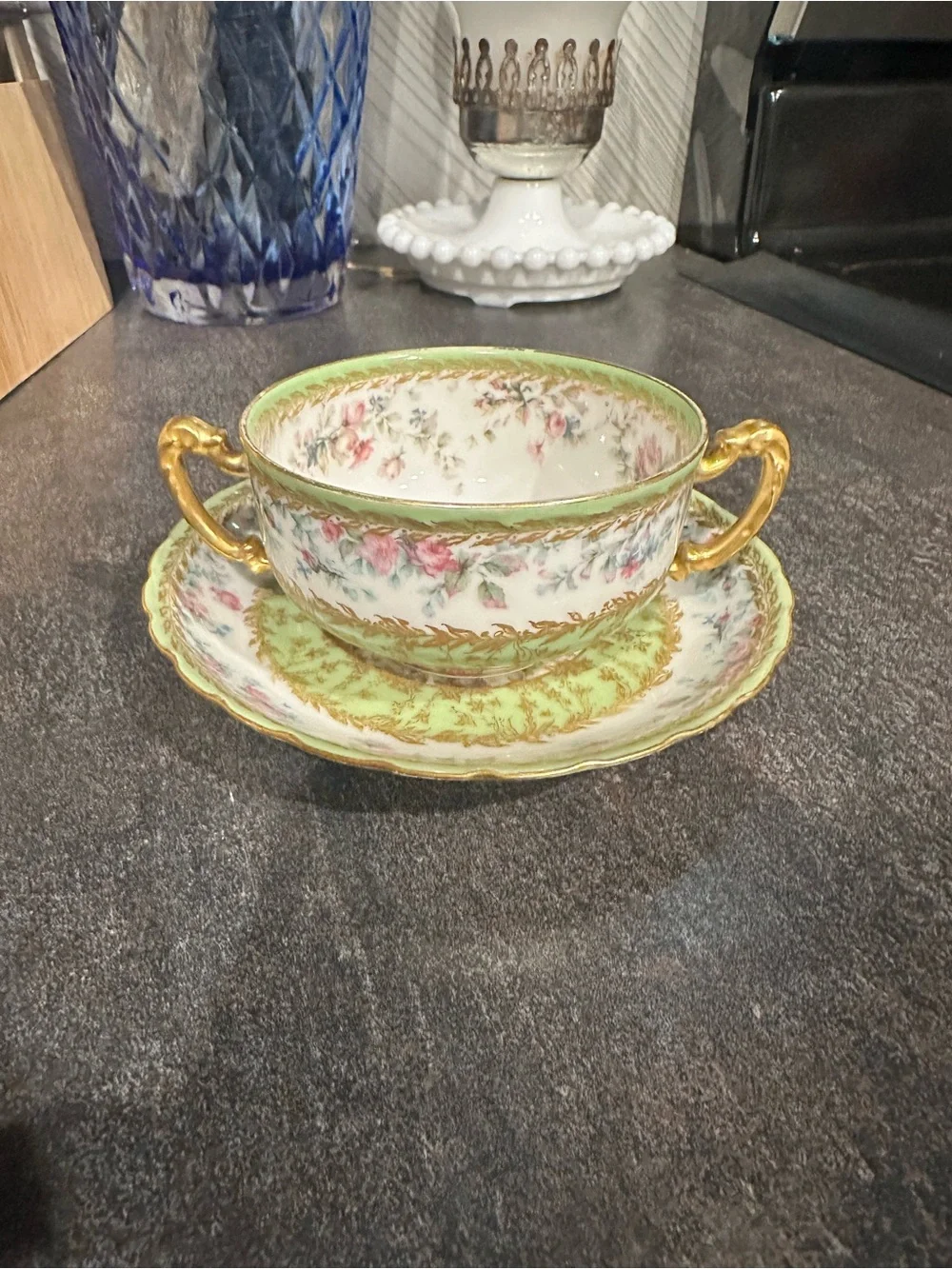 Haviland Porcelain Two-Handled Soup Cup and Saucer in Green, Pink and Gold